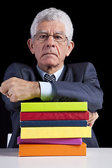 Image showing Senior teacher reading Books