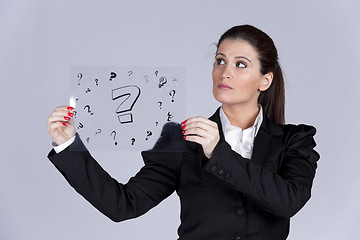 Image showing Businesswoman questions