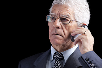 Image showing Senior Businessman talking at the cellphone