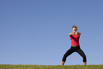 Image showing woman doing exercise outdoor