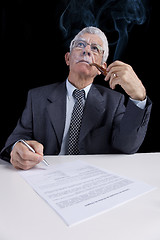 Image showing Senior businessman at the office