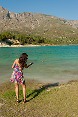 Image showing Throwing stones