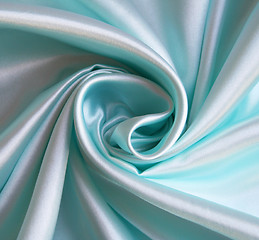 Image showing Smooth elegant blue silk as background 