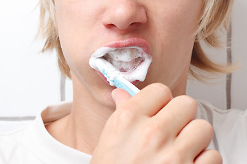 Image showing Brushing teeth