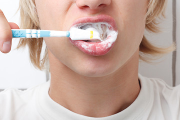 Image showing Brushing teeth