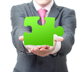 Image showing Businessman with puzzle