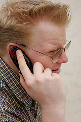 Image showing Serious phone call