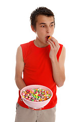 Image showing Boy eating popcorn