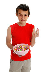 Image showing Boy with snack food popcorn