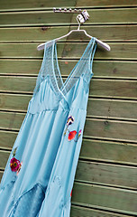 Image showing Blue satin dress