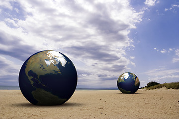 Image showing 3d earth on a beach
