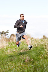 Image showing Mixed race man running