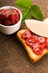 Image showing Wild strawberry jam with toast