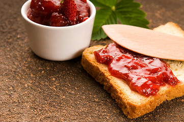 Image showing Wild strawberry jam with toast