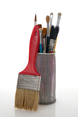 Image showing Paintbrushes in a metal mesh holder