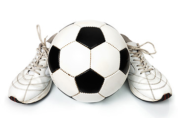 Image showing Pair of sneakers and soccer ball