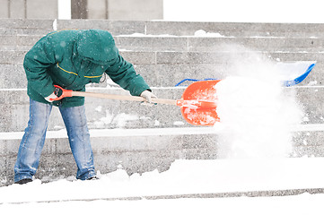 Image showing Man shoveling winter snow