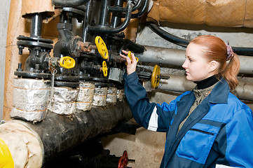 Image showing woman engineer in a boiler room