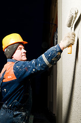 Image showing builder plastering facade wall