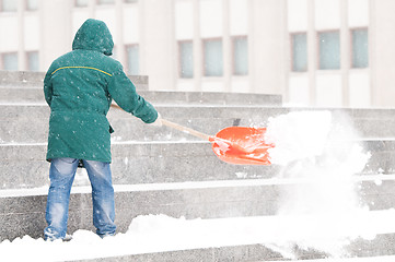 Image showing Man shoveling winter snow