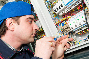 Image showing Electrician at work