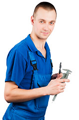 Image showing worker with caliper