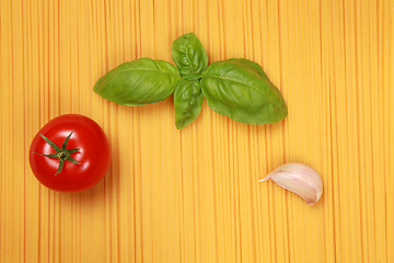 Image showing Spaghetti with tomato, garlic and basil