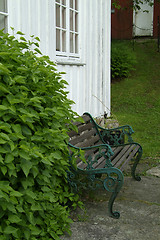 Image showing Bench and old house