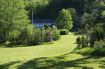 Image showing Old, wooden house in big garden