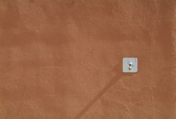 Image showing Water tap on a concrete wall