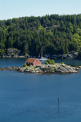 Image showing Sailboat at anchor in Norwegian fjord