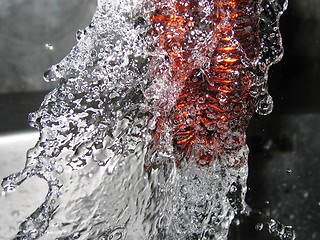 Image showing Pouring golden