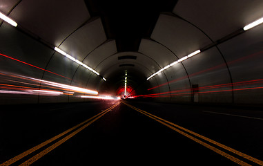 Image showing Vehicles Passing Fast in a Tunnel Leaving Light Streaks