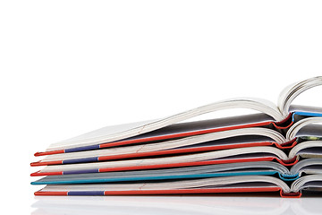 Image showing pile of book with bending pages