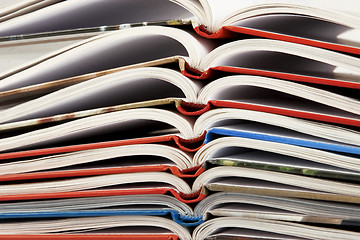 Image showing pile of book with bending pages