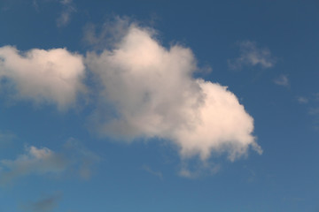 Image showing Fluffy clouds in the blue sky