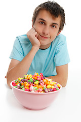 Image showing Smiling boy with bowl of popcorn