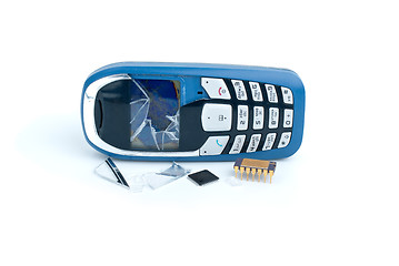 Image showing Broken cellular phone and two microchips