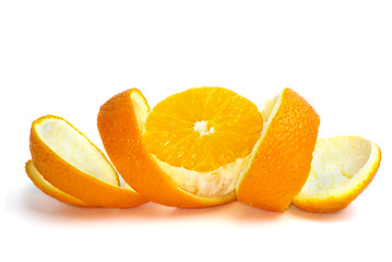 Image showing Orange slice over the some peel