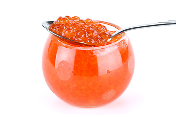 Image showing Metal spoon and glass bowl with red caviar