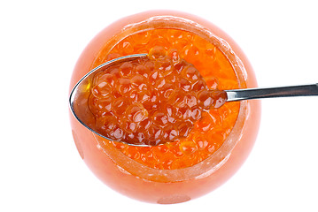 Image showing Small metal spoon and glass bowl with red caviar (View from above)