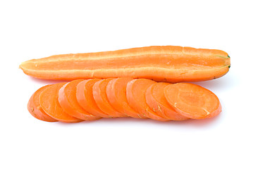 Image showing Half of ripe fresh long carrot and some slices