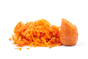 Image showing Some grated carrot and half