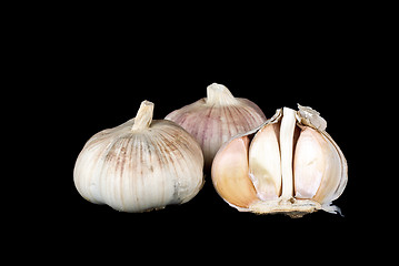 Image showing Garlic bulbs whole and half