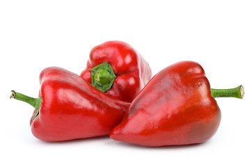 Image showing Three red sweet peppers