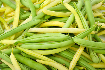 Image showing Green and yellow wax bean pods