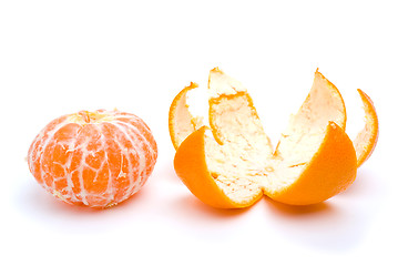 Image showing Peeled tangerine and peel