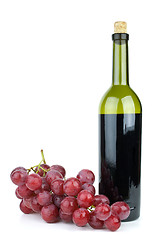 Image showing Wine bottle and grapes isolated on the white background