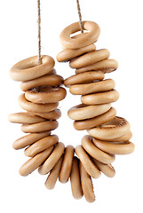 Image showing Some bread-rings hanging on rope