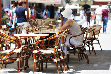 Image showing Girl in street bar